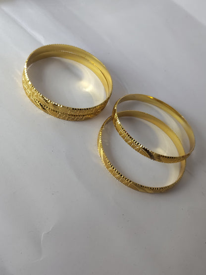 Elegant Gold-Plated Textured Designer Bangles for Women (Set of 4)